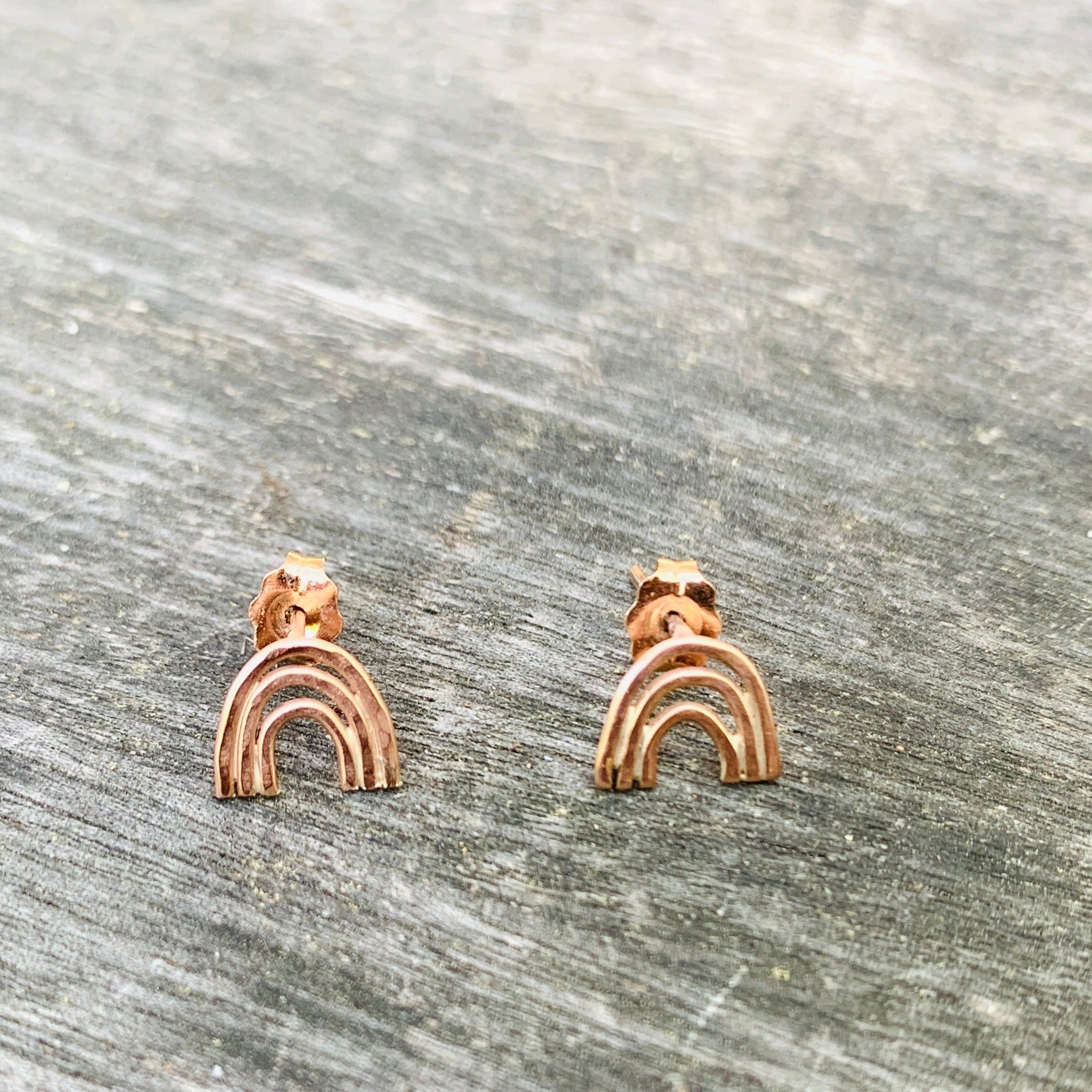 Solid 10k rose gold rainbow studs.  1/4" x1/4"